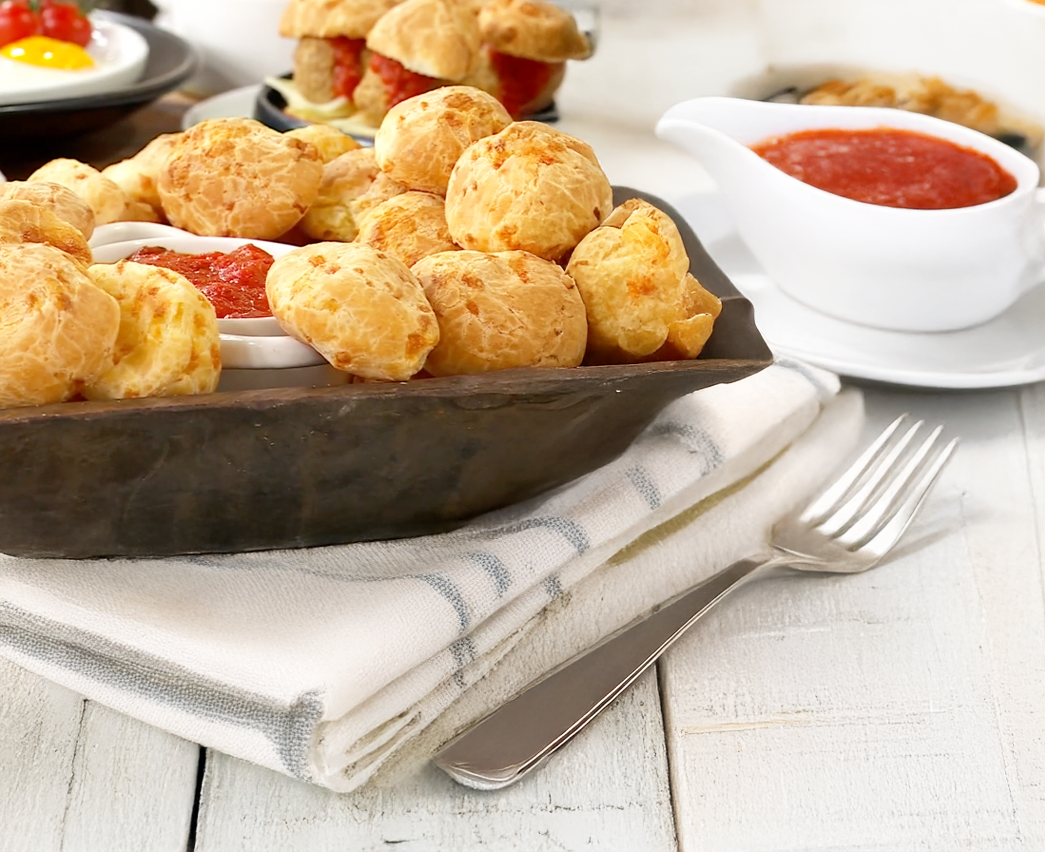 Papa Mountain cheese bread rolls served with marinara sauce, with a plate of meatballs in the background
Gluten-free cheese bread rolls with marinara dipping sauce — easy clean-label comfort food with meatballs for busy familiesWarm Papa Mountain cheese bread rolls paired with savory marinara sauce and hearty meatballs — the ultimate freezer-to-table family meal
#PapaMountain
#GlutenFreeComfortFood
#EasyFamilyMeals
#CheeseBreadRolls
#FreezerToTable
#CleanLabelSnacks
#WeeknightDinner
#DairyDelicious