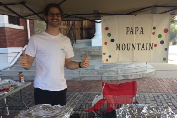 Papa Mountain's cheese bread rolls displayed at a Saturday market, highlighting their quick, wholesome, and natural ingredients perfect for families.