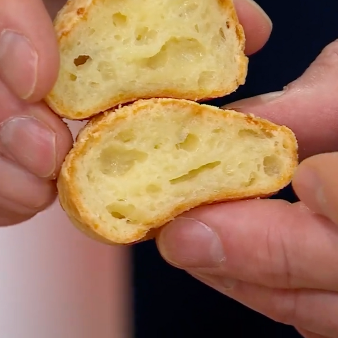 Two Papa Mountain cheese bread rolls stacked, showing golden baked texture and cheesy surface Gluten-free cheese bread rolls by Papa Mountain stacked to show crisp crust and clean label indulgence Golden, gluten-free cheese bread rolls stacked warm and ready comfort food reimagined by Papa Mountain #StackedGoodness
#PapaMountain
#GlutenFreeCheeseBread
#CleanComfortFood
#WholesomeAndCraveable
#SnackStack
#CheesyAndGolden
#BiteSizedBliss
#ModernComfortFood
#FreezerSnackGoals
#BetterForYouIndulgence